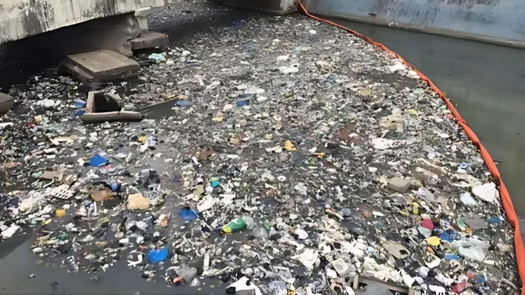 WavePlus Trash Boom floating on water, designed for waste containment and environmental protection.