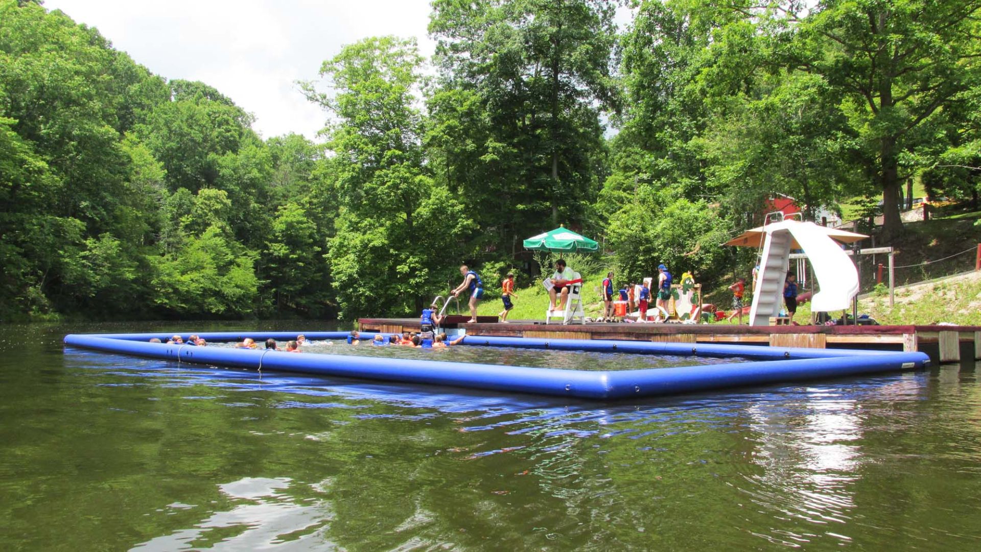 WavePlus floating beach boom securing a children's swimming area.